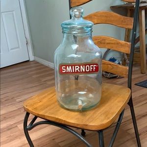Big clear class jar with spout at the bottom